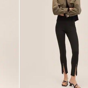 MANGO STYLISH slit hem leggings. Black
